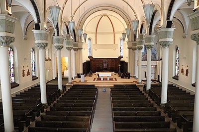 Interior of the restored Pro-Cathedral, with the restored oak panels and new lighting