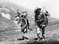 Italian Bersaglieri before World War I with folding bicycles strapped to their backs