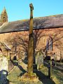 View of the Viking Cross and church, from the SW