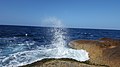 Okines beach water spray