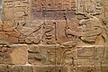 Sandstone wall of King Aspelta offering Ma'at (Truth) to ram-headed god Amun-Re accompanied by Anukis, Temple T at Kawa Ashmolean Museum I9J2.I295.[6]