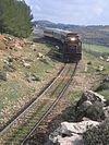 Modern CFS passenger train, hauled by General Electric Class U17C, north of Aleppo on the former Baghdad Railway