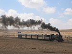 A steam locomotive pulls an excursion train on the Hejaz Railway in 2007