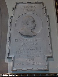 stone plaque showing George V in right profile