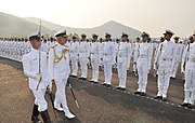 The Chief of Naval Staff reviewing the Guard of Honour during Passing-out parade at Indian Naval Academy.