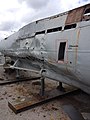 Aft starboard side showing depth charge damage and Pillenwerfer chute (rectangular hole)