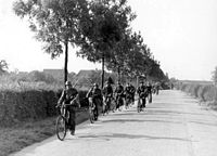 Wehrmacht troops advancing on bicycles in 1944