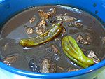 Dinuguan, a stew made from pig's blood, varies per region.
