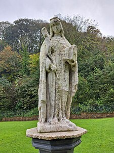 Sculpture of St Winefride near the chapel