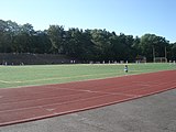 The running track, grand stand, and turf soccer field