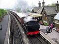 A historical train pulling in from Bow Bridge sidings