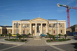 Neoclassical two story building with Greek style columns