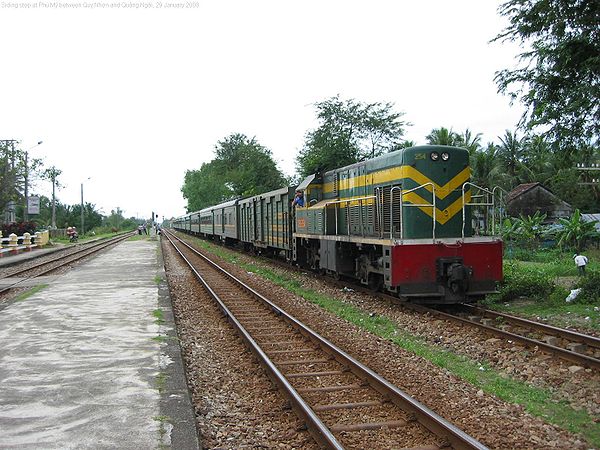 Northbound Đường sắt Việt Nam local train on passing siding at Phù Mỹ between Quy Nhơn and Quảng Ngãi