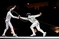 Image 17 Fencing Photo: Marie-Lan Nguyen Fencing is the sport of fighting with swords; in modern usage the word usually denotes competitive fencing, rather than classical fencing. Here, Fabian Kauter (right) hits Diego Confalonieri (left) with a flèche attack at the final of the Challenge Réseau Ferré de France–Trophée Monal 2012. More selected pictures