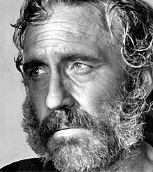 A black-and-white photo of Robards with an untamed beard