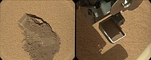 first scoop of soil taken by Curiosity, the Mars rover