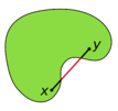 Illustration of a non–convex set, which looks somewhat like a boomerang or cashew nut. A (green) non–convex convex set contains the (black) line–segment joining the points x and y. Part of the line segment lies outside of the (green) non–convex set.