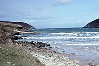 Bay shore, surrounded by hills