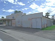 Marlatt's Garage was built in 1922 and is located at 1249 E. 8th St.. The property was built by Clyde Gililland. Here he established his Gililland Motor Co. Garage business. Gililland served as Tempe's mayor for one year (1960-1961). Eugene Marlatt owned the property from 1933 until his death in 1981. The property is listed in the Tempe Historic Property Register.
