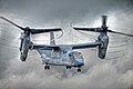 A V-22 Osprey tilt-rotor aircraft at an airshow in 2012