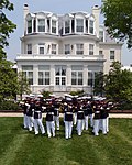 Photograph of the U.S. Marine Corps Commandant's House across the Barracks' parade ground.