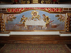 The altar with Jesus Christ and two pilgrims