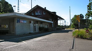 Two-story station building with gabled roof
