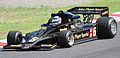 Takuma Sato Driving a Lotus 78 with its John Player Special Livery