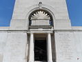The inscriptions in English and French either side of the memorial tower entrance