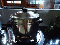 Idli steaming in cooker