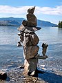 Inuksuk on Osoyoos Lake shore of Sẁiẁs Provincial Park in Osoyoos, looking south with Washington state near Oroville in the distance (July 2020)