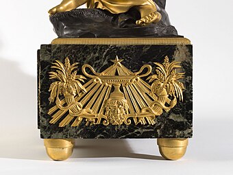 Neoclassical cornucopias on the pedestal of a clock, by Antoine André Ravrio, early 19th century, marble and gilt bronze, Petit Palais