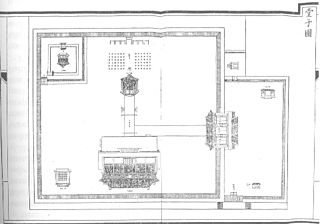 A black and white schematic map showing a square courtyard with a rectangular courtyard to its right. The buildings face the direction from which one was supposed to enter it, so some buildings appear upside down or oriented sideways.