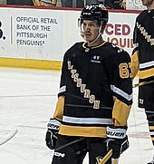 Rakell wearing his Pittsburgh Penguins uniform on the ice
