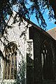 The corner of the south transept, showing the perpendicular south window contrasted with the earlier decorated east window