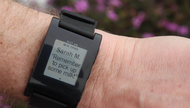 A smartwatch displaying an email message