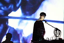 Kember performing in 2013