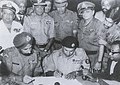 Image 30The Surrender of Pakistan took place on 16 December 1971 at the Ramna Race Course in Dhaka, marking the liberation of Bangladesh. (from History of Bangladesh)