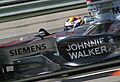 McLaren had no title sponsor in 2006年 but the Johnnie Walker logo was used on the side pods, as evidenced by Juan Pablo Montoya's McLaren MP4-21 at the 2006 United States Grand Prix. From this year onwards, the team has also used a highly reflective version of its silver livery.