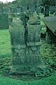 A tombstone made from carved stones taken from the old kirk