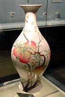A vase with peaches design