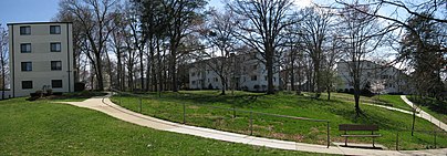 Extensive pedestrian paths connect residences, in this case feeding into a tunnel beneath the primary collector roadway