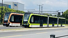 Two Autonomous Rail Rapid Transit vehicles parked together in Shanghai, China