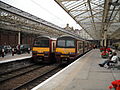 Class 320s 306 and 308 at Helensburgh Central