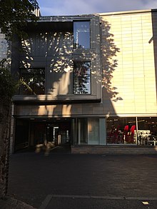 Entrance to a shopping centre in a modern building