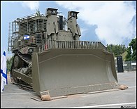 IDF Caterpillar D9. Armored bulldozers are standard combat engineering tools, as they can perform construction, destruction and EOD missions under heavy fire.