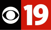 A conjoined rectangle: to the left, a black rectangle with the CBS eye logo in white; to the right, a red square with "19" in white text.