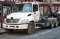 Hino 338 three-axle hook truck