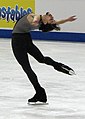 A man performs layback spin (Rohene Ward)