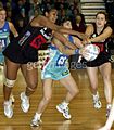 18 June 2004: Vilimaina Davu (left) and Peta Stephens (right) playing for Canterbury Flames against Southern Sting in the 2004 National Bank Cup final at Stadium Southland. They compete with Sting's Natalie Avellino.
